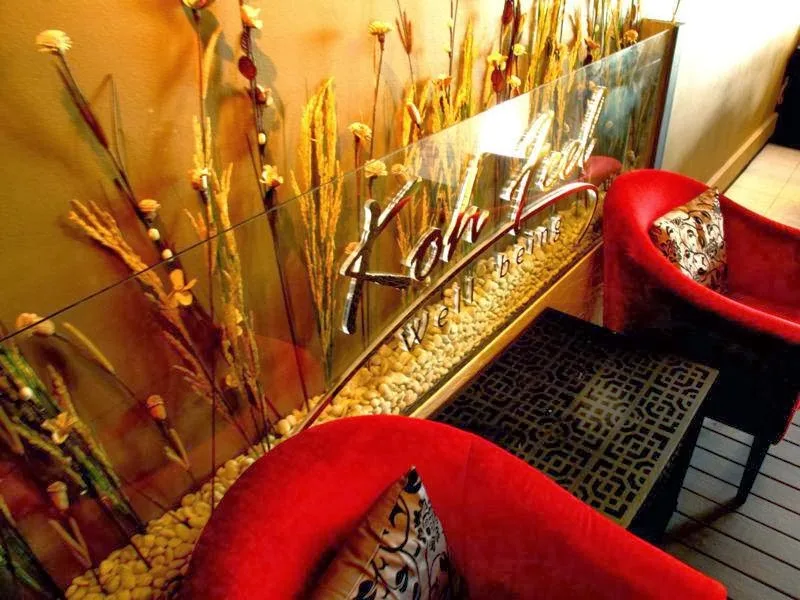 Koh Feel etched glass signage and welcoming reception area